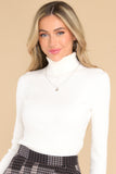 Over The Night Ivory Ribbed Turtleneck Top